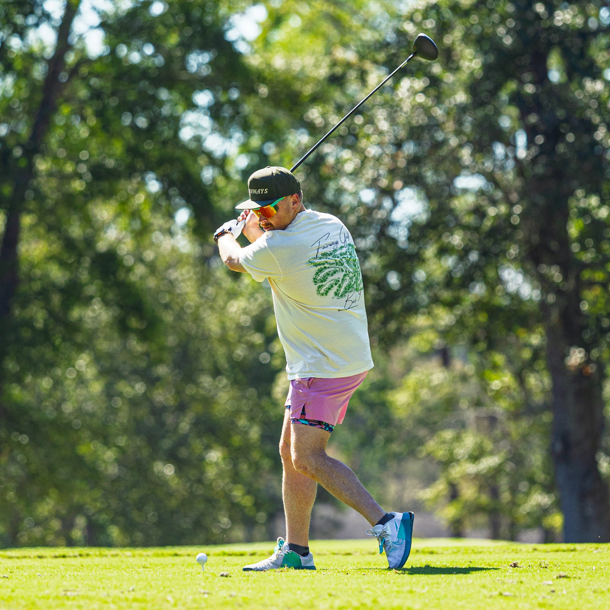 Back 9 Tee worn during a golf swing