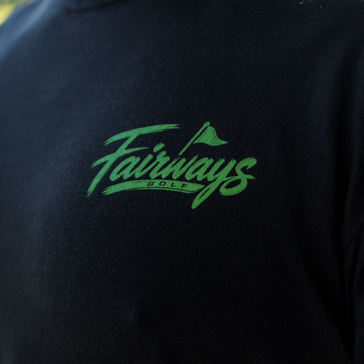 Just One More Hole Tee chest logo and fabric detail